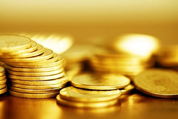 Ouro e bitcoin dividem investidores em meio à euforia e incerteza global